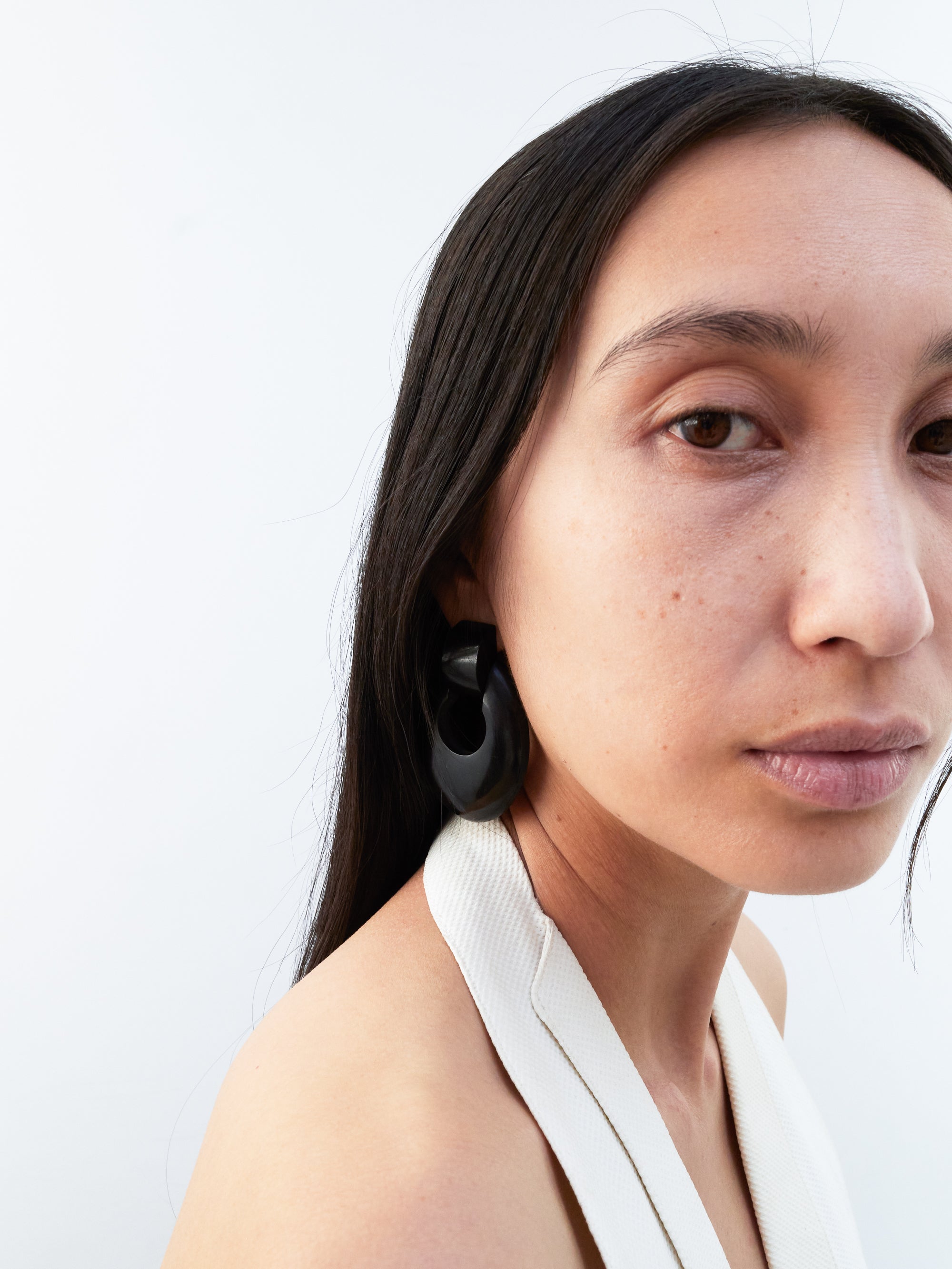 Horn clip earrings