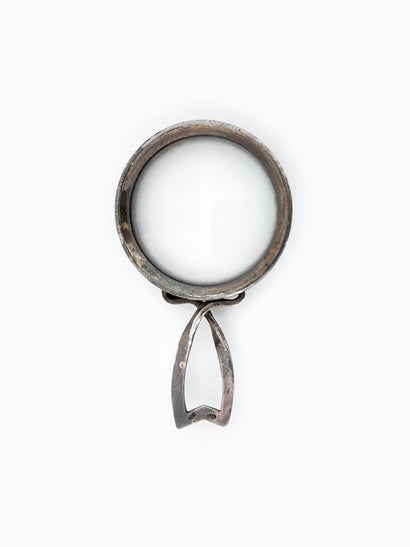 Silver magnifiying glass