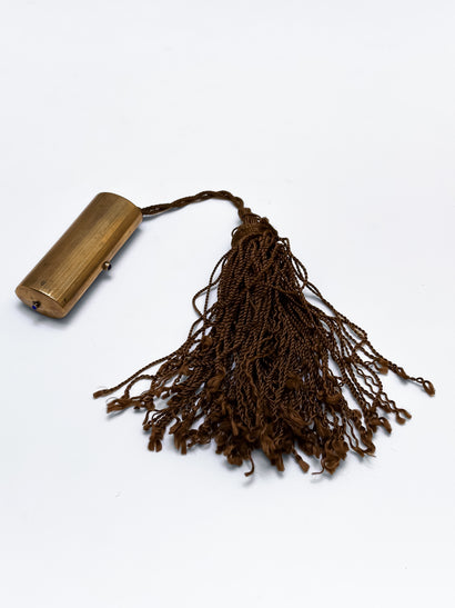 Brass box with tassel