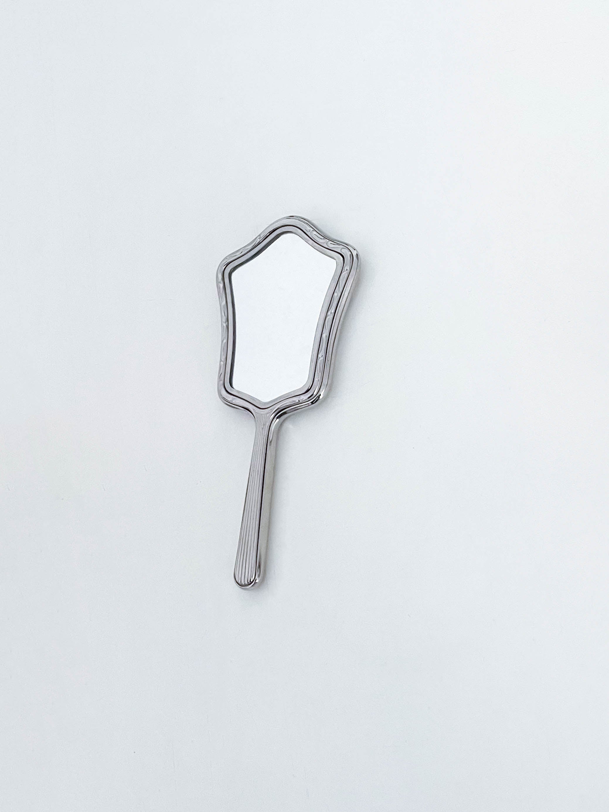 Small metal mirror